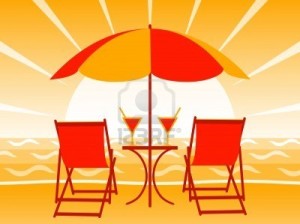 7885912-deck-chairs-drinks-and-umbrella-on-the-beach-in-sunset